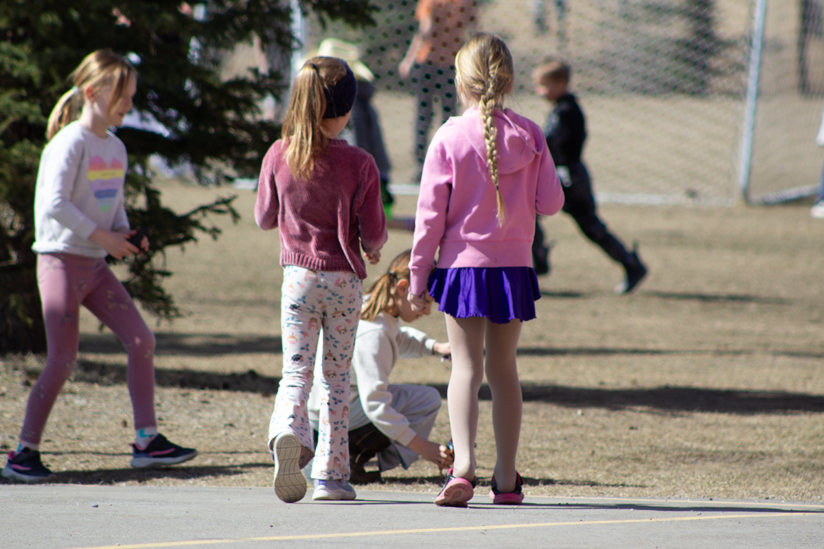 Photo of students in a school playground